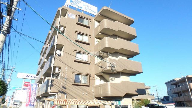 霧島市隼人町見次のマンションの建物外観