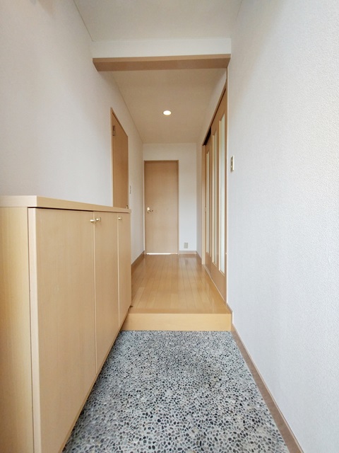 芳斉プラザ114の玄関写真