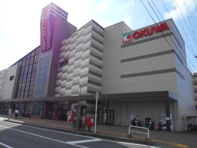 ショッピングセンター　オークワロマンシティ御坊店様（ショッピングセンター）まで450m