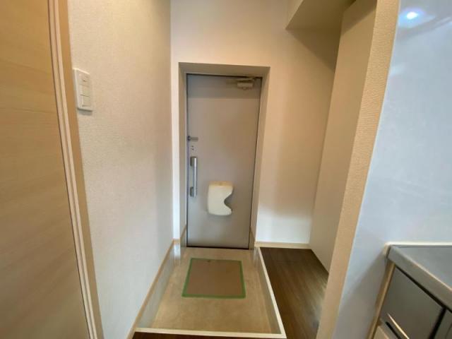 アルカディア NIの玄関写真