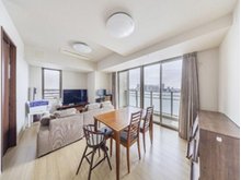 都営大江戸線 春日駅 徒歩5分 17階建 築13年の居間写真