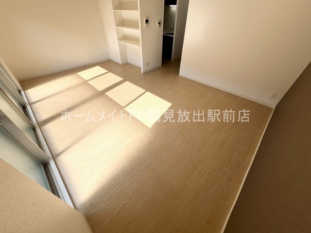 地下鉄長堀鶴見緑地線 横堤駅 徒歩10分 3階建 築12年の居間写真