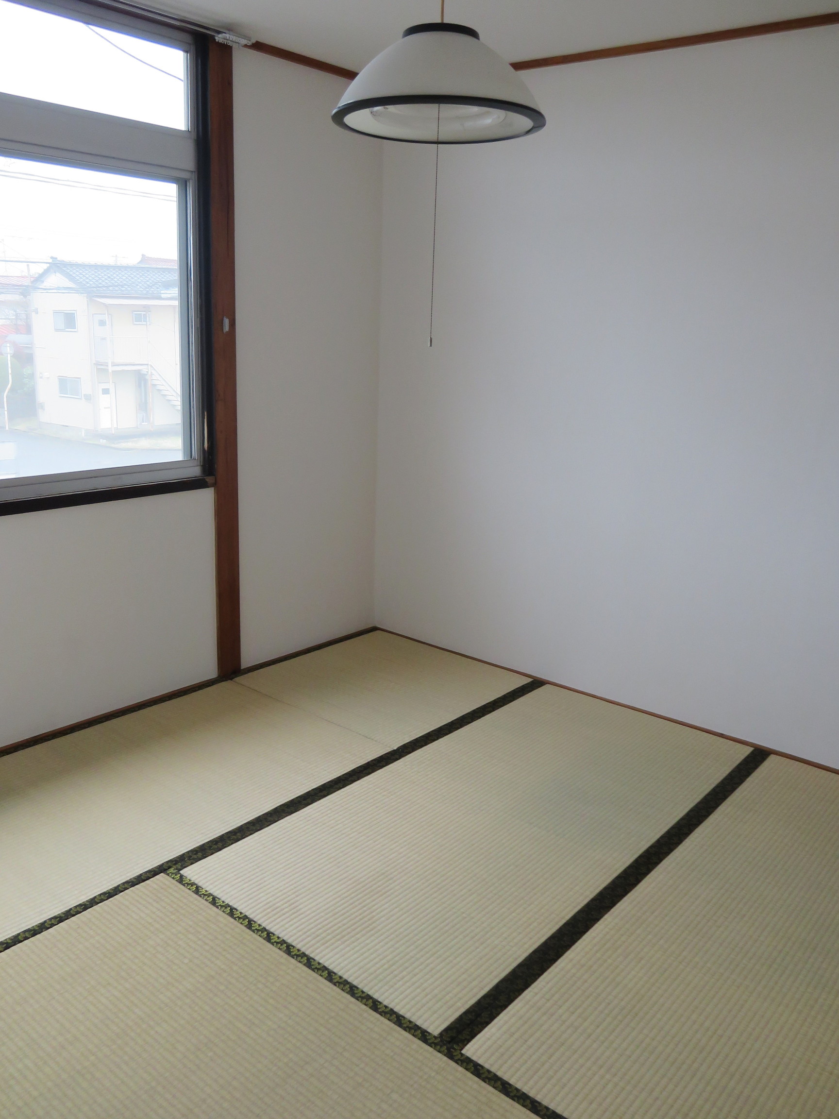 エクレール泉 酒田市東泉町1丁目の居間写真