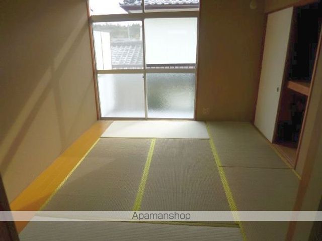 小島グリーンハイツの居間写真