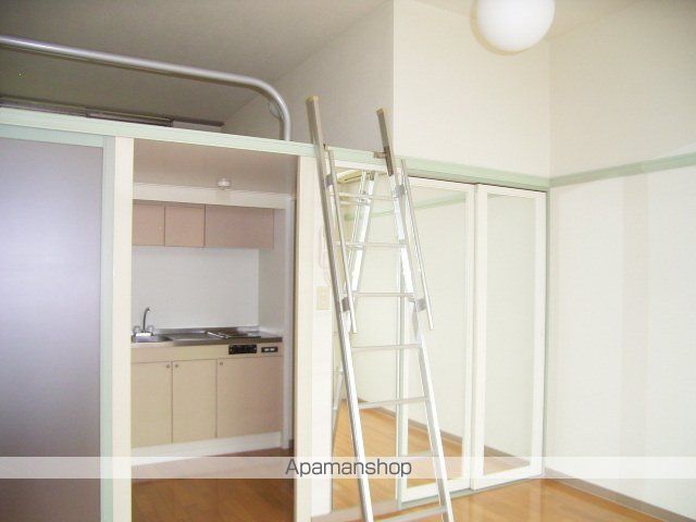 ロイヤル岩切IIの居間写真
