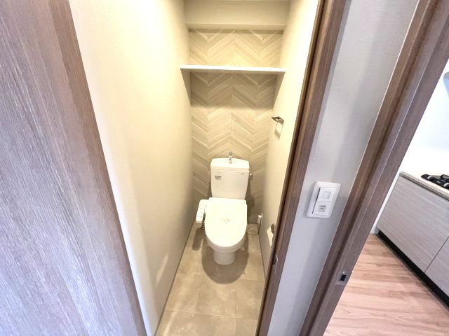 トイレ　写真は、他部屋の同間取りとなっております。