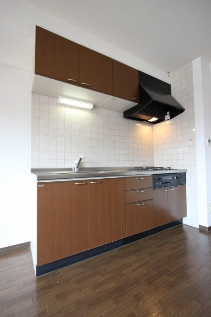 キッチン　写真は別号室のものです。