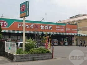 ドラックストア　ドラッグセガミ南江口店（ドラッグストア）まで436m