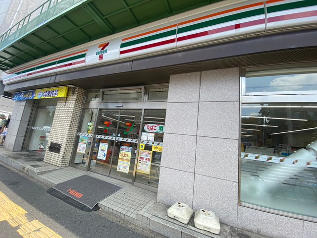 コンビニ　セブンイレブン足立中居郵便局前店（コンビニ）まで118m