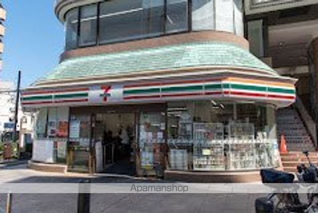 その他　【コンビニエンスストア】セブンイレブン　京成町屋駅前店（その他）まで888m