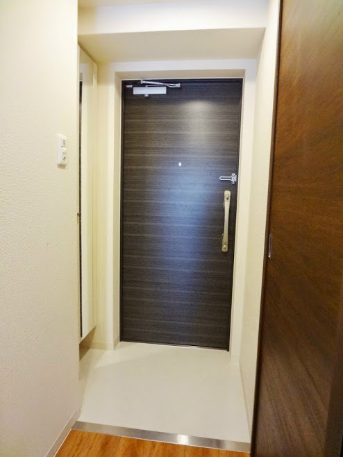 玄関　※別部屋のお写真になります