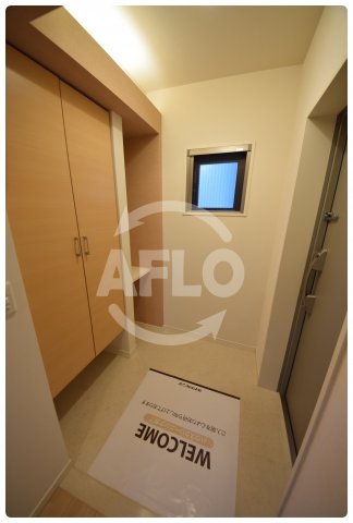 玄関　ソレイユ真田山　玄関