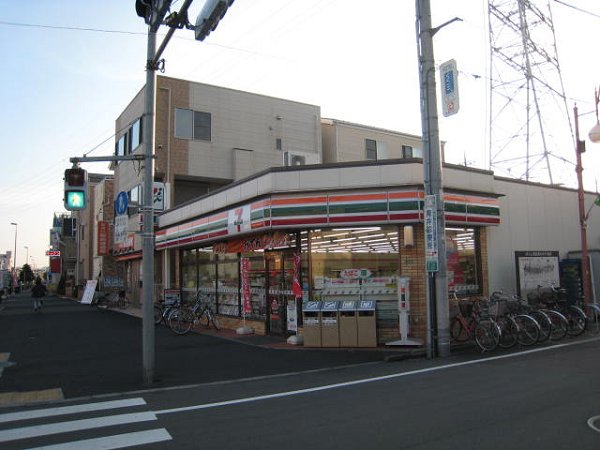 コンビニ　セブンイレブン（コンビニ）まで129m