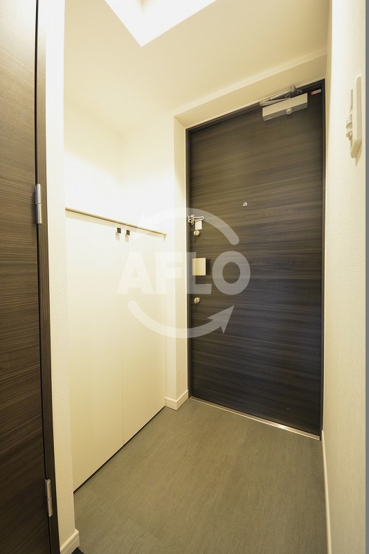 玄関　レジュールアッシュ上町台　玄関