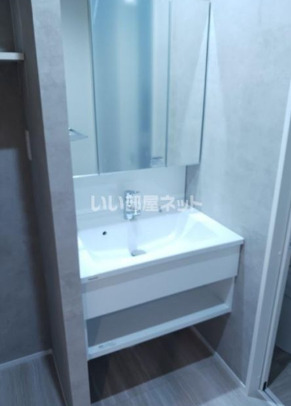 洗面設備　写真は別居室のものです。