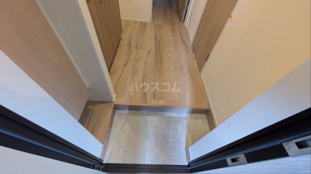 飯山満町3丁目APの玄関写真