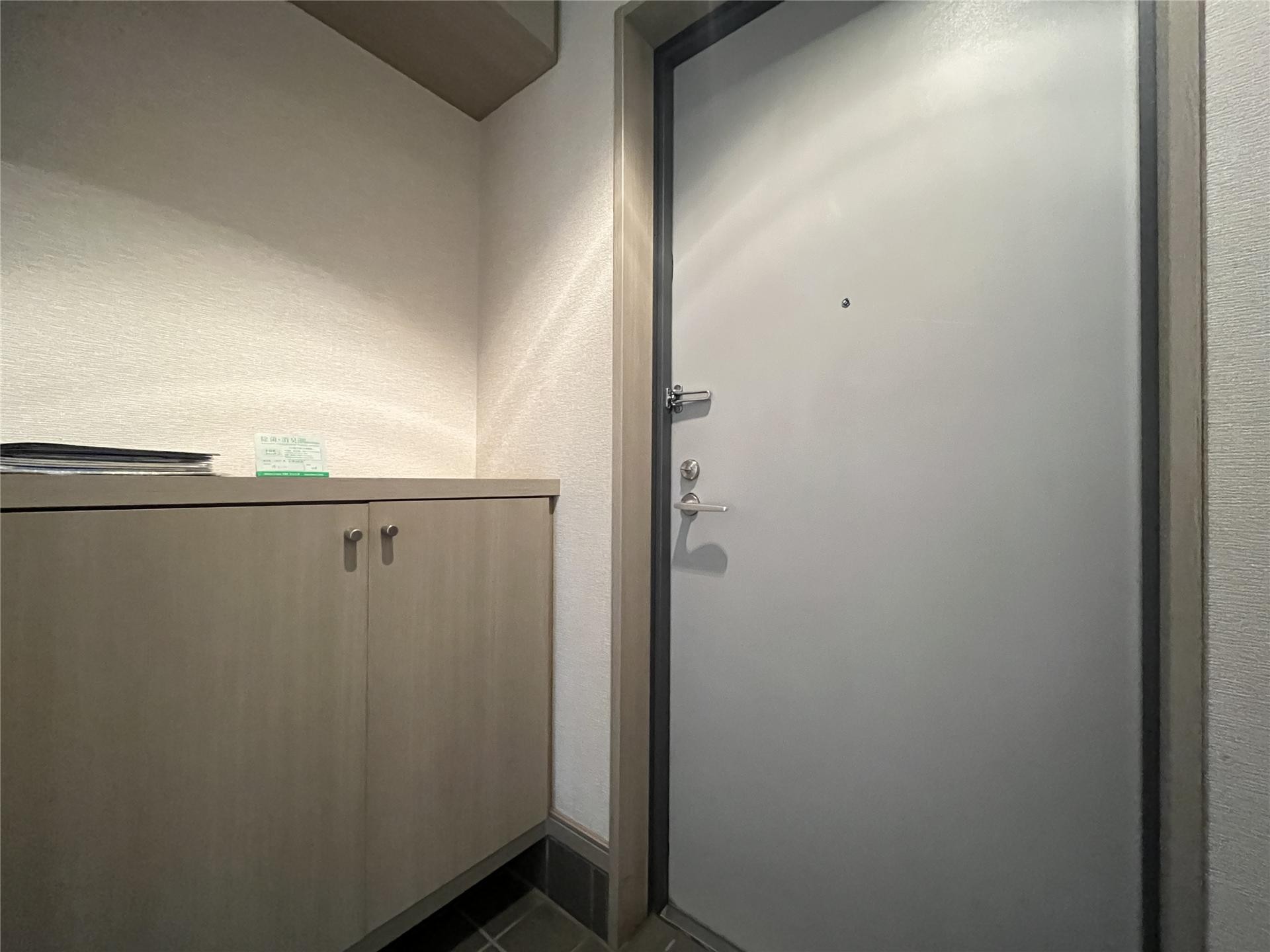 ガーデンタカラおおくぼ台202の玄関写真