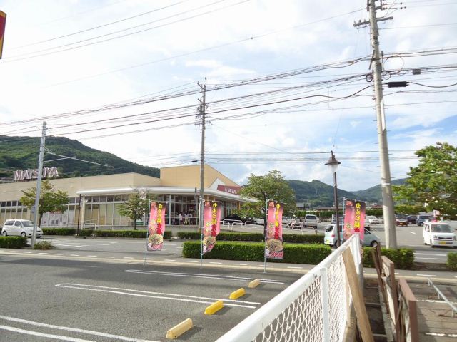 スーパー　デリシア（スーパー）まで860m