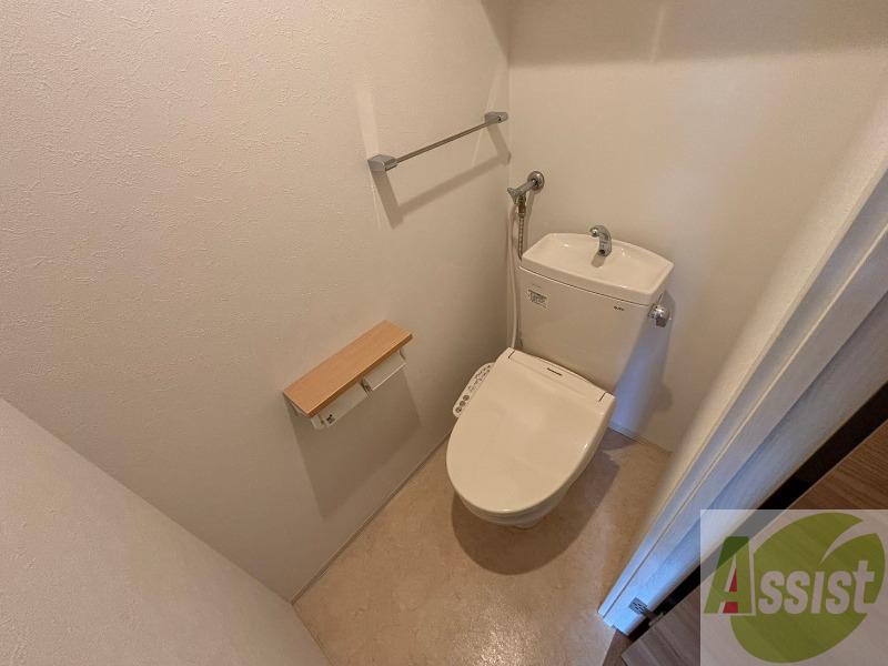 地下鉄南北線 麻生駅 徒歩7分 4階建 築8年のトイレ写真