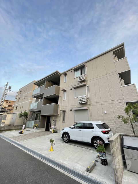 池田市桃園のアパートの建物外観