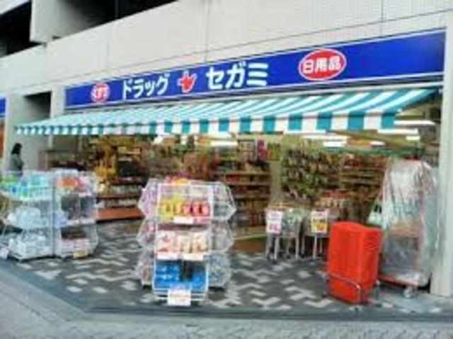 ドラックストア　ドラッグセガミ西田辺店（ドラッグストア）まで750m