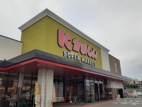 スーパー　かましんカルナ駒生店（スーパー）まで861m