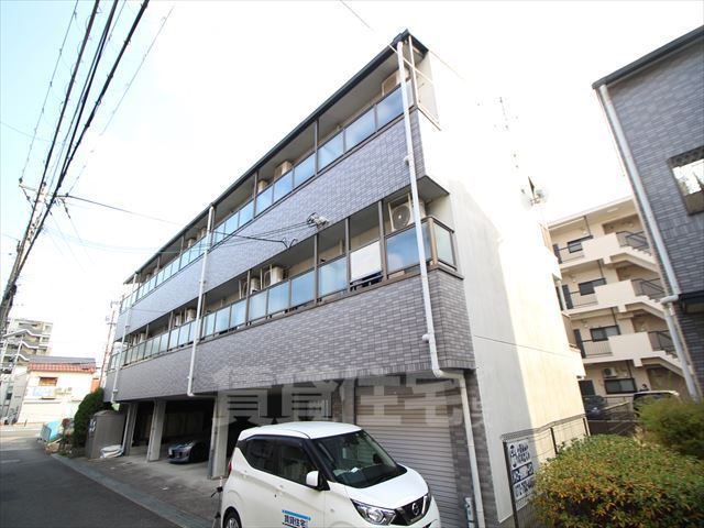 【三島郡島本町桜井のマンションの建物外観】