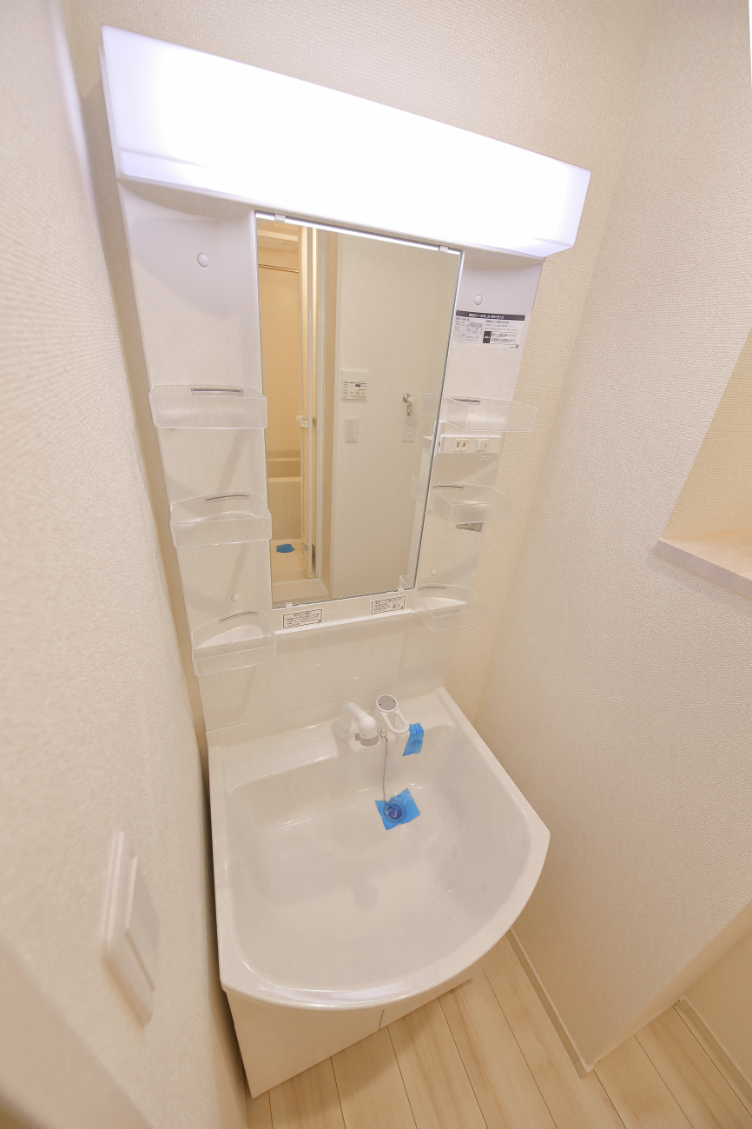 洗面設備　202号室の写真を引用