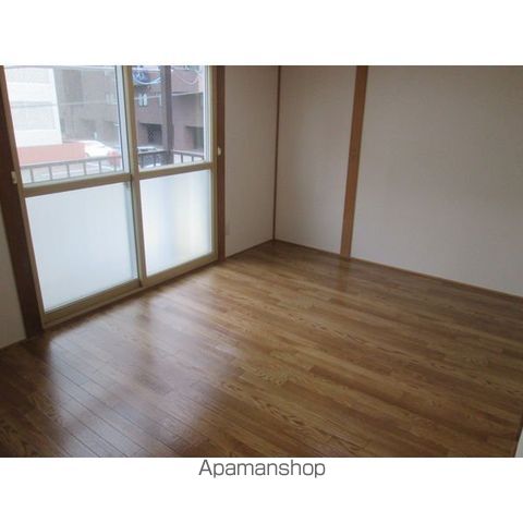 野崎マンション406の居間写真