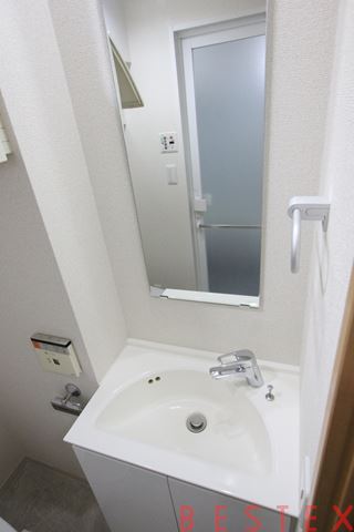 洗面設備　※写真は別階の同間取りとなります。