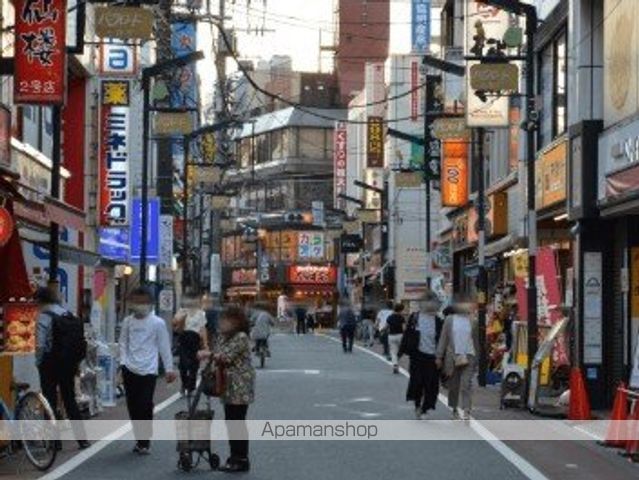 コンビニ　ファミリーマート大田池上三丁目店（コンビニ）まで409m