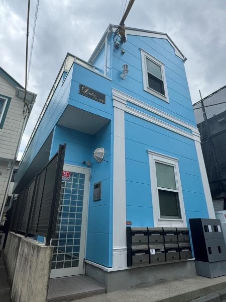 建物外観　ピンクのかわいい外観をしております。
