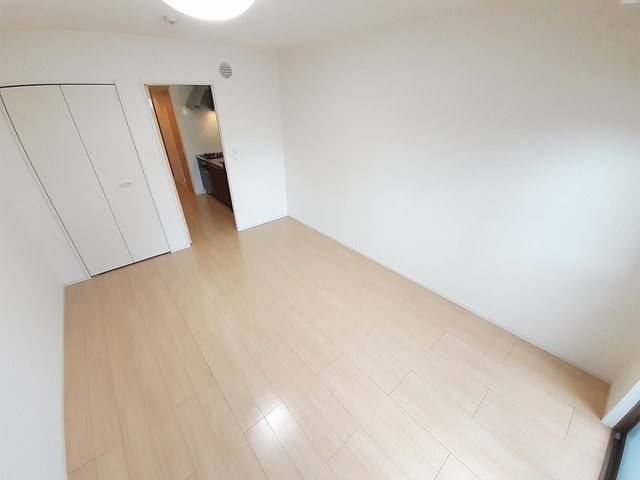 メゾン Shinkaの居間写真