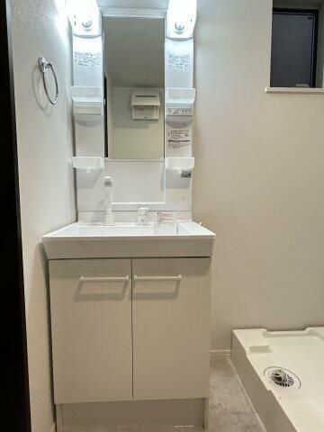 洗面設備　同施工、別建物の参考写真となります