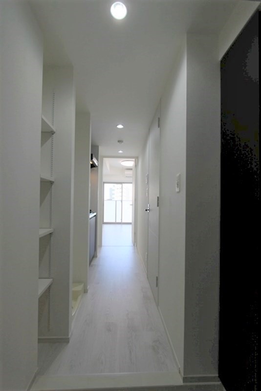 玄関　ブラウンタイプのお部屋になります。