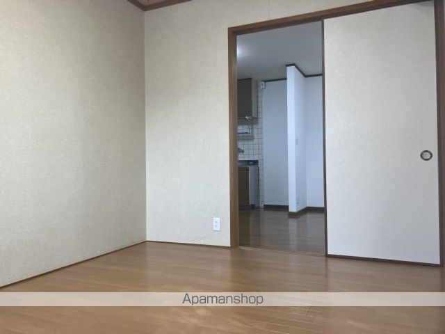 インフィールド牛田新町の居間写真