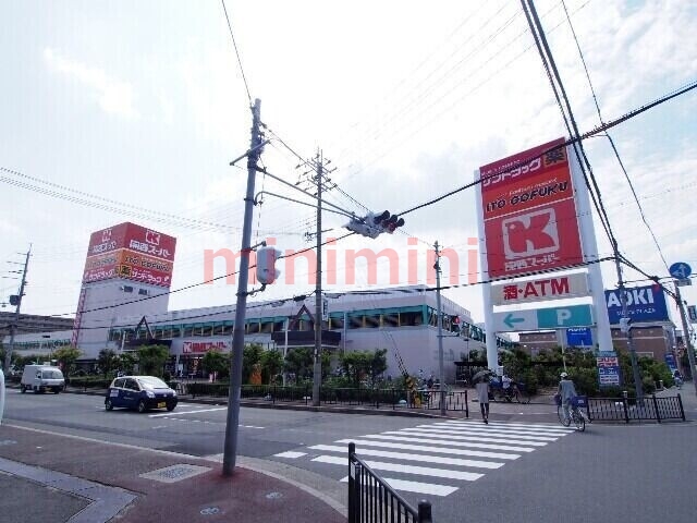 ドラックストア　スギ薬局高槻西冠店（ドラッグストア）まで1213m
