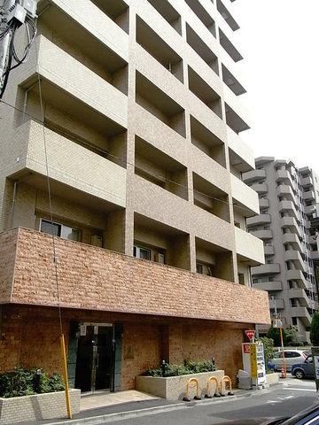 建物外観　総タイル貼りの重厚感あふれる外観・分譲賃貸マンション