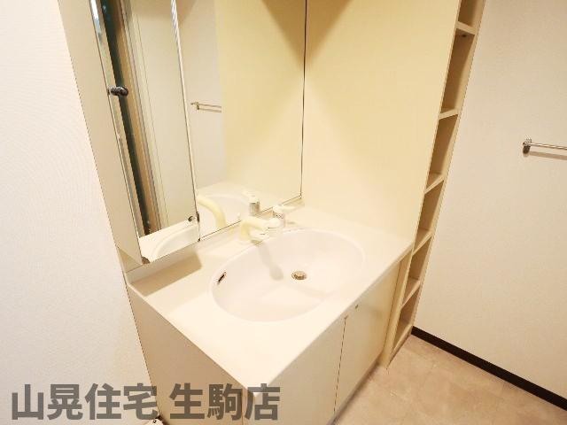 【生駒市東生駒のマンションの洗面設備】