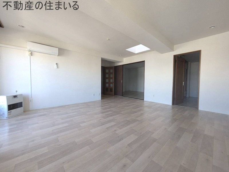 メイゾン真駒内の居間写真