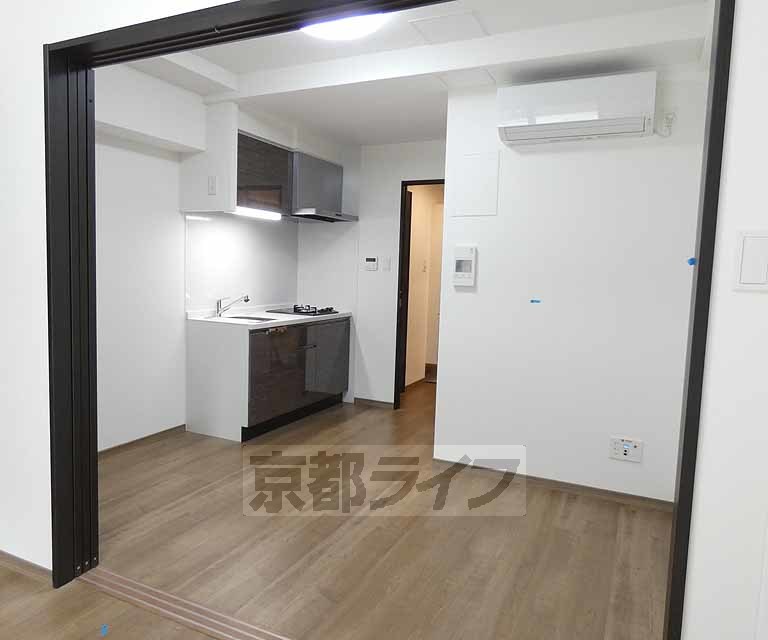 ベラジオ雅び烏丸十条IIの居間写真