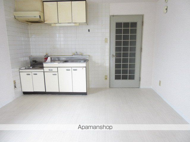 ビッグバーンズマンション本通の居間写真