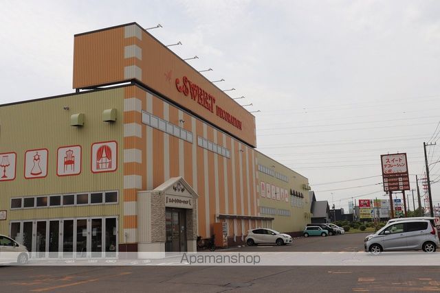 ショッピングセンター　スイートデコレーション新苫小牧店（ショッピングセンター）まで385m