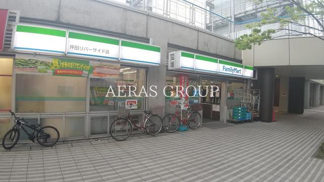 コンビニ　ファミリーマート 坪田リバーサイド店（コンビニ）まで423m