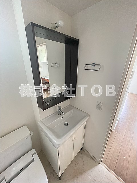 洗面設備　※クリーニング中の写真