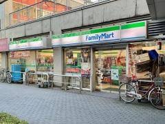 コンビニ　ファミリーマート 坪田リバーサイド店（コンビニ）まで75m