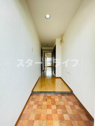 地下鉄御堂筋線 西中島南方駅 徒歩9分 7階建 築29年の玄関写真