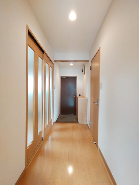 芳斉プラザ114の玄関写真