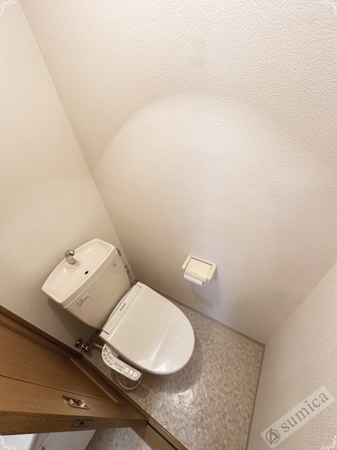 トイレ　※４０３号室・リフォーム前の写真となります。