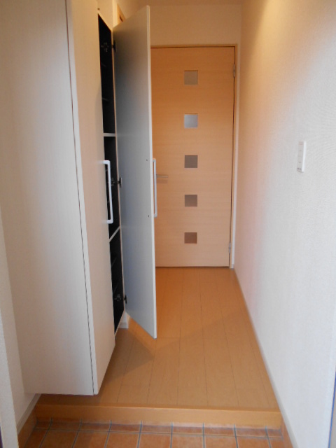 フレクスーラ蟻ヶ崎の玄関写真